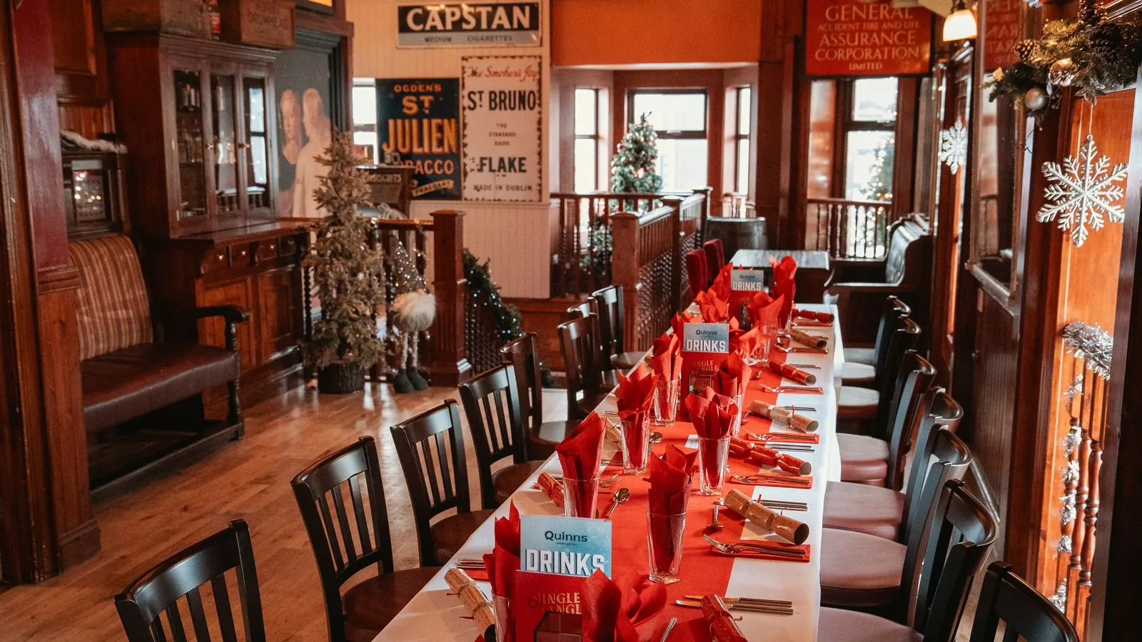 Christmas tables under the old Capstan and St Bruno tobacco signs